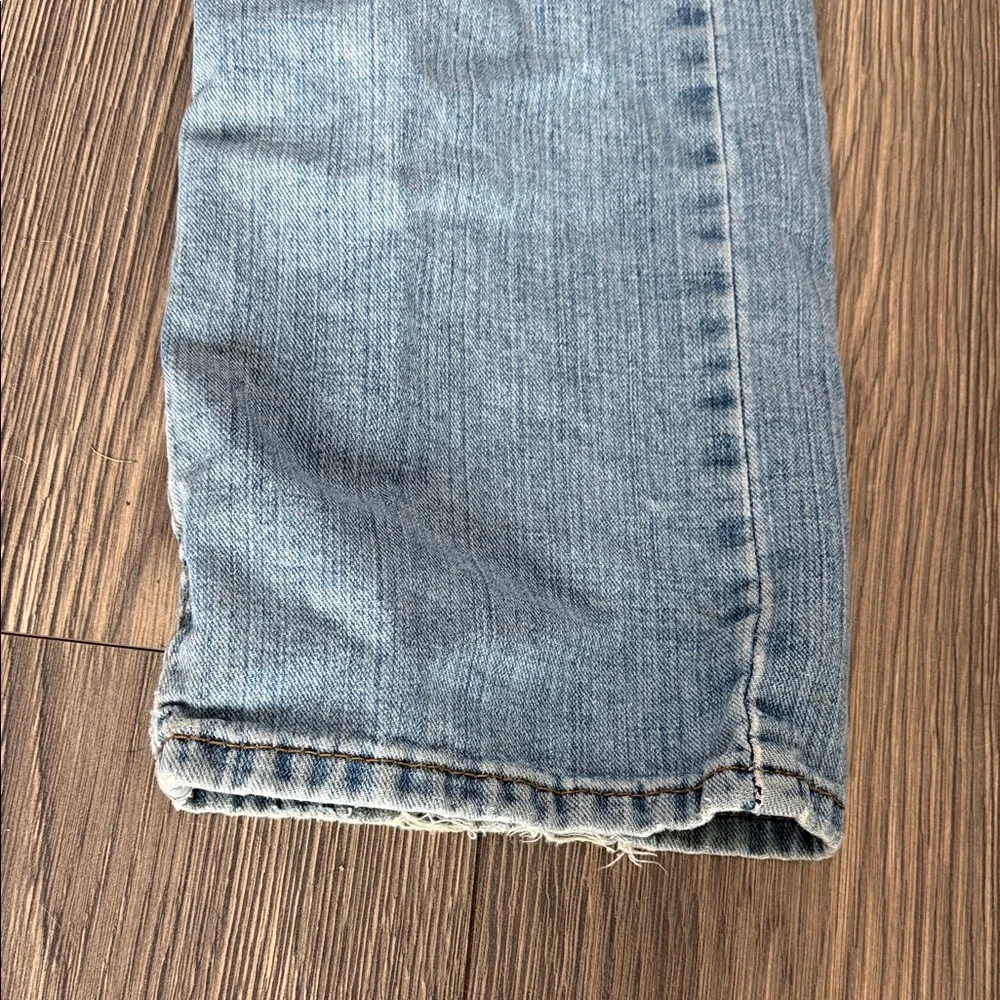 Levi's Light Blue Straight Jeans with Distressed Details